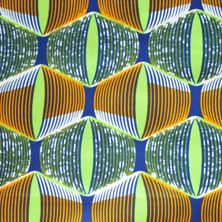 Lime Green, Orange and Blue Eyes Fabric